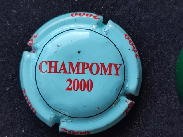 capsule de champagne "champomy an 2000 " côte de ? euros.