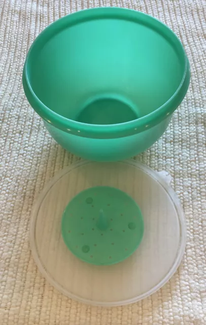https://www.picclickimg.com/ddoAAOSwhtNkdNTz/Vintage-Tupperware-1424-Jadeite-Green-Crisp-It-Lettuce.webp