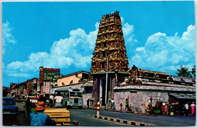 VINTAGE POSTCARD AN INDIAN TEMPLE AND STREET SCENE AT SINGAPORE 1960s