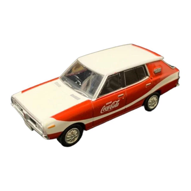 Ambulance Tomica Cadillac en blanc/rouge dans une boîte (fabriquée au Ambulance Tomica Cadillac en blanc/rouge dans une boîte (fabriquée au
