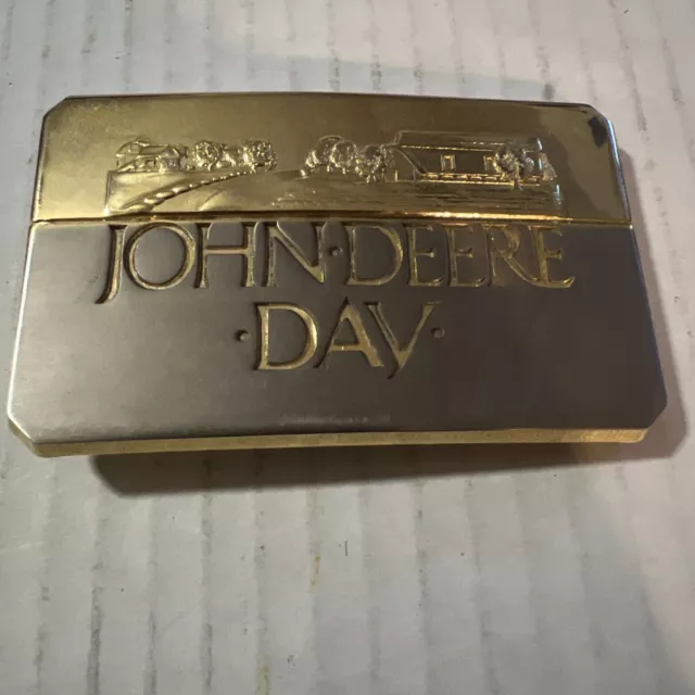 Vintage 1988 2 Tone John Deere Day Belt Buckle. Approximately 3 ¼” x2”.