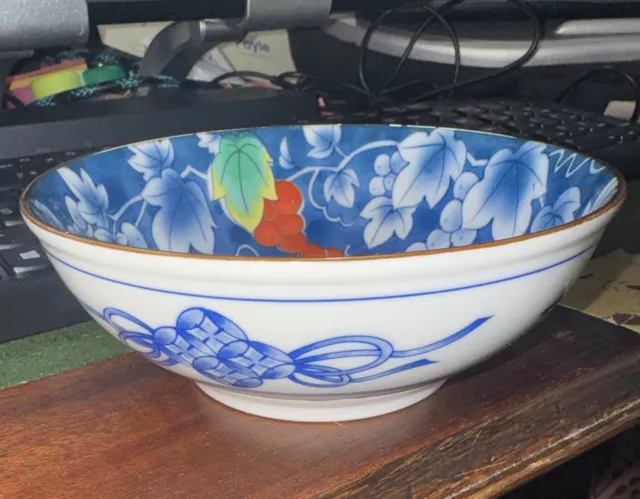 A Japanese Arita Ware Bowl With Vine And Grapes