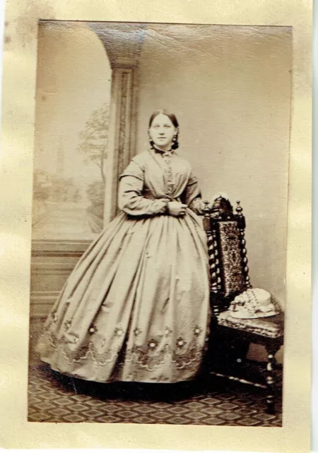 Victorian cdv type photo young woman standing long dress matching hat on chair