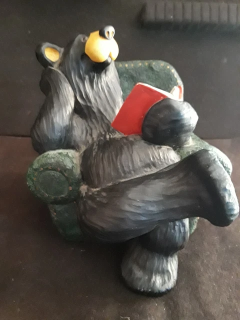 BearFoots black Bear Bob Armchair reading a book Big Sky Carvers Jeff Fleming #