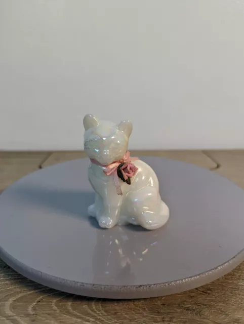 Fenton White Opal Iridescent Cat Figurine With Porcelain Flower and Ribbon Bow