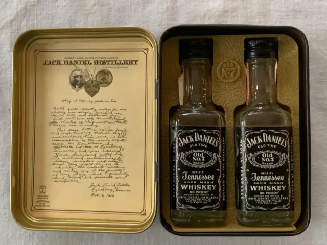 JACK DANIELS VINTAGE OLD No. 7 TIN WITH TWO EMPTY BOTTLES
