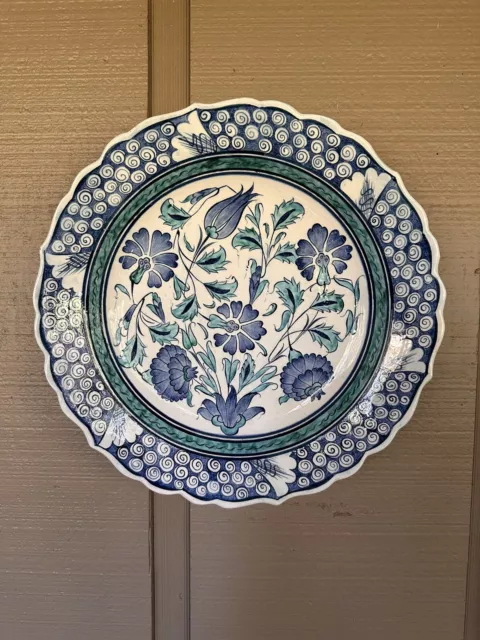 Vintage decorative plate with flowers, original design From 14th Century.