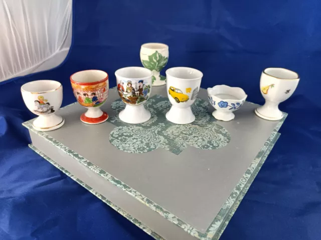 Lot de 7 coquetiers porcelaine ,faience,etc... 2