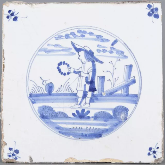 Dutch Delft Blue tile, shepherd and a sheep in landscape, circa 1800.