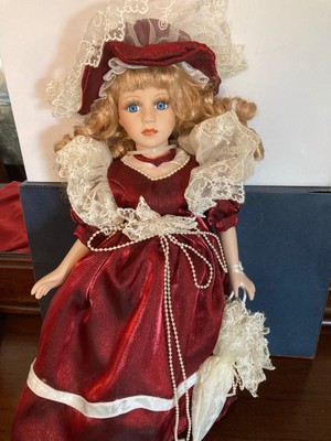 Porcelain Doll  16" Blond Hair  and  Blue Eyes Red Velvet Dress Hat Pearl & Lace