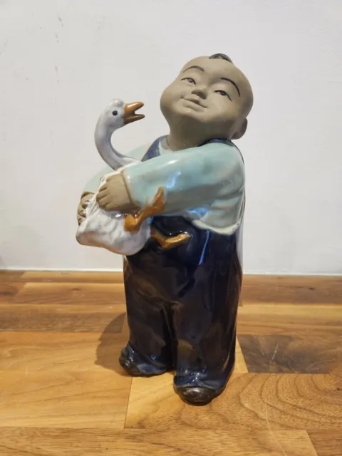 Chinese Ceramic Shi Wan Mud Men Happy Boy Holding Duck  8" tall
