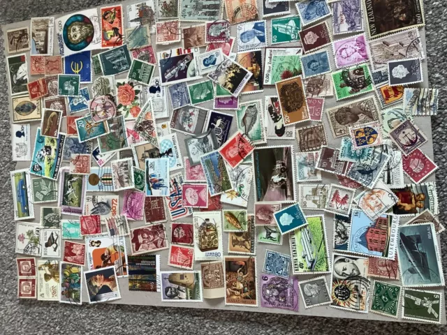 100+ stamps many countries,all different, old & new.Get collecting today.