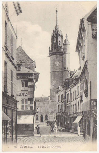 CPA 27 EVREUX La Rue de l’Horloge n° 36 – attelage – pas LL