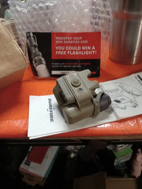 SUREFIRE Helmet Light Model HL1-C-TN - New In Box (Tan) SUREFIRE Helmet Light Model HL1-C-TN - New In Box (Tan)