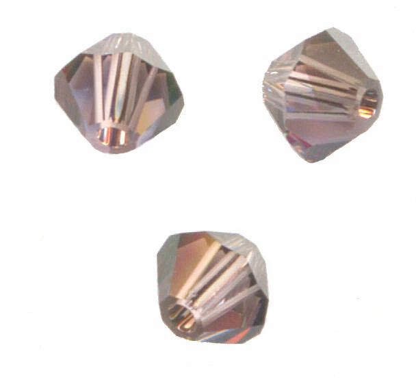 site parisien..20 PERLES TOUPIES SWAROVSKI    5mm   LIGHT AMETHYST SATIN .