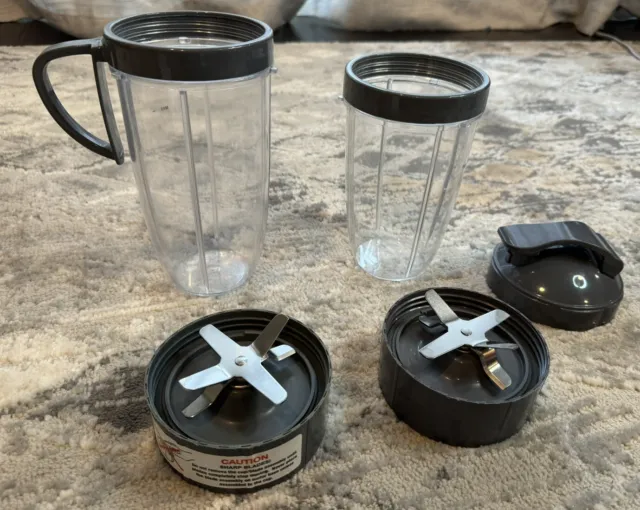 32 oz Cup, 24 oz Cup, 2 Extractor Blade, Cup Handle, Lip Ring, Lid, NutriBullet
