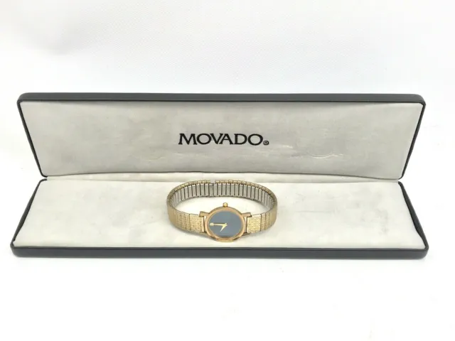 Orologio da polso vintage Movado Museum da donna 87-25-832, quadrante blu scuro; cassa dorata 10