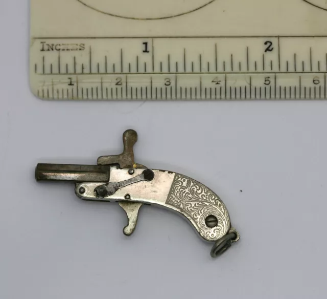 GERMAN MINIATURE TOY  2mm PIN FIRE PISTOL, ,4cms LONG, LOCKS AND FIRES