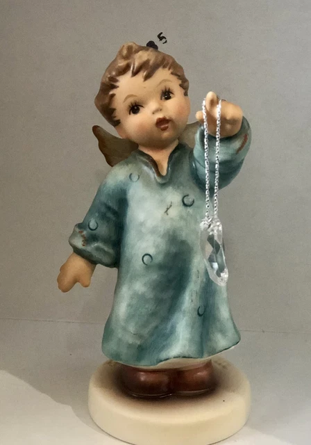 hummel figurines moon beam 4.5in with swarovski crystal moon. hummel figurines moon beam 4.5in with swarovski crystal moon.
