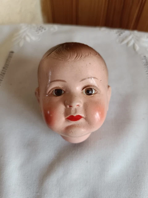 Claudinet SNF en robe de baptême
