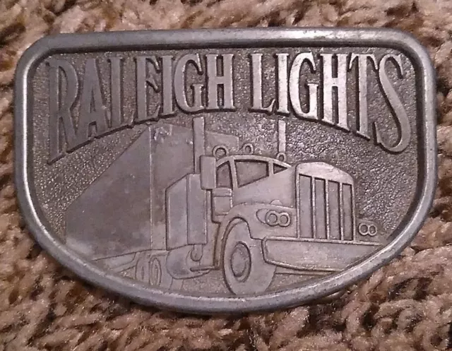 Vintage Trucker Raleigh Lights Cigarettes Advertising Belt Buckle