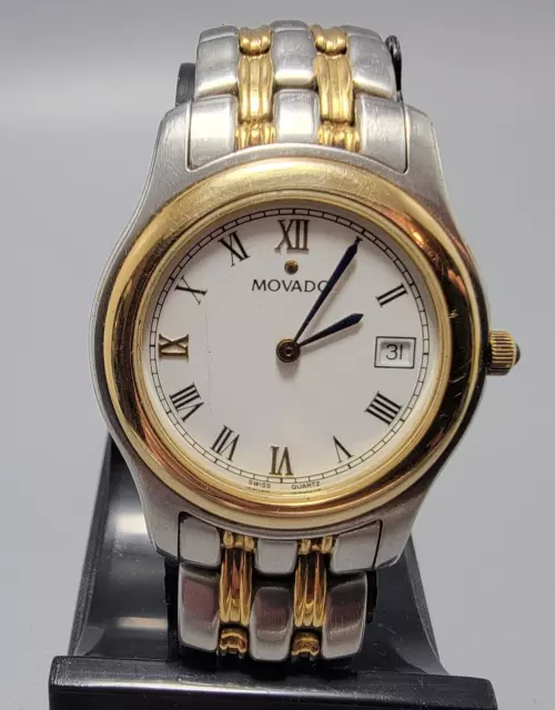 Movado Mens 35mm Quartz watch with date display - Swiss made -new battery!
