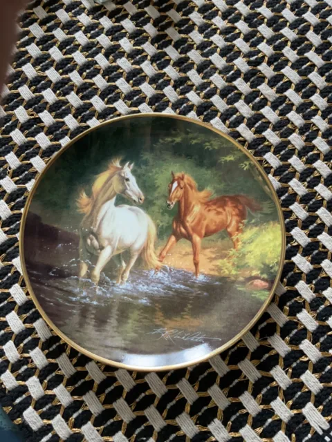 Assiette Franklin mint,  porcelaine numerotées et signée thème : chevaux