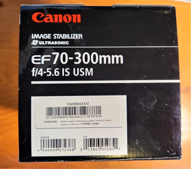 Near-Mint Canon EF 70-300mm f/4-5.6 IS USM Telephoto Zoom Lens. Ordinal box caps