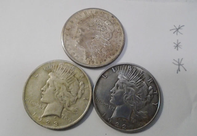 US Silver Dollars Lot of 3 -One Morgan 1921, Two Peace 1922 and 1923