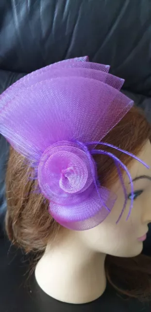 Unusual Lilac Layered Comb Fascinator With Rosette Detail & Whispy Feathers