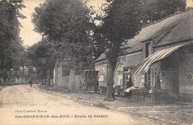 Cpa 91 Sainte Genevieve Des Bois / Route De Corbeil / Marchand