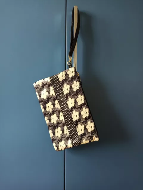 Pochette astuccio ARIA donna bianco e nero optical fiori pois