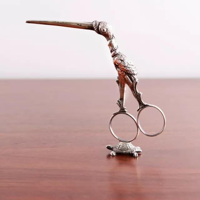Figural Dutch 800 Silver Ribbon Threader Stork W/ Ruby Eyes & Baby Within