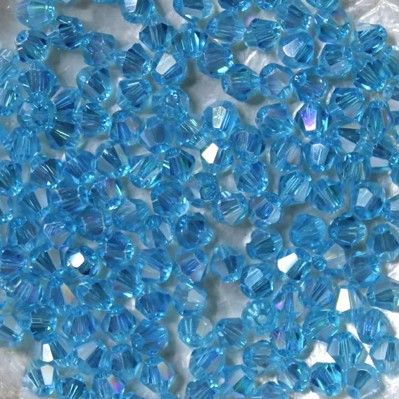 25 Perles Cristal -TOUPIES SWAROVSKI - CAPRI BLUE "AB"  243  - 4 mm