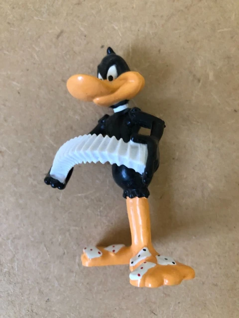VINTAGE WARNER BROS. Looney Tunes. Vinyl Figure of Daffy Duck £15.00 ...