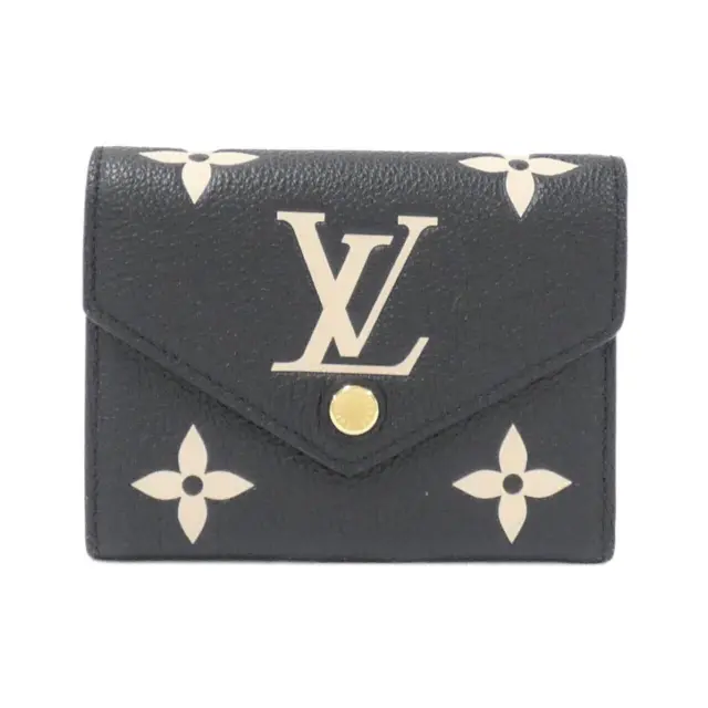 Louis Vuitton, large Monogram Empreinte wallet, eggplant…