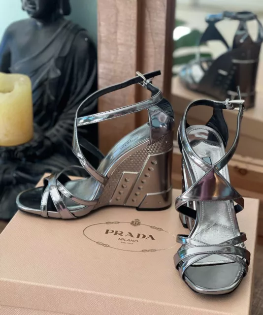 New with box/dust bag Prada metallic leather crisscross wedge size 38