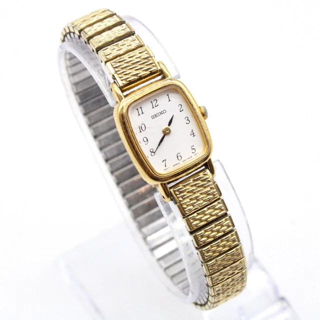 Vintage Seiko Watch Women Gold Tone Classic 1N00-5K29 Rectangle Stretch Band