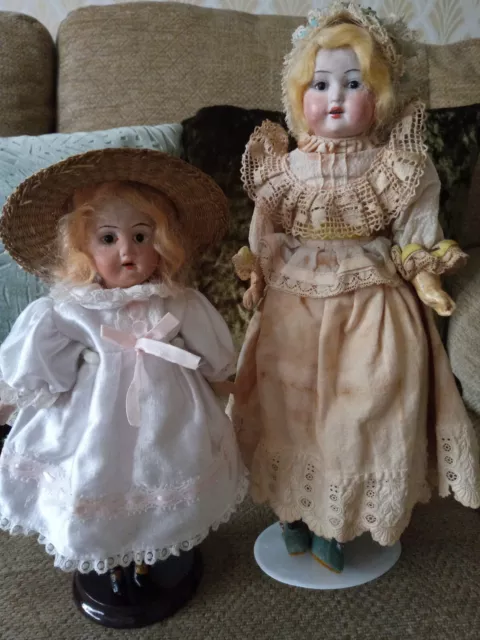 Two Antique Bisque Head Dolls Both Damaged.
