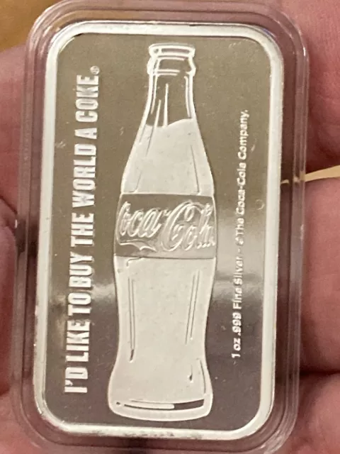 Barra de Coca-Cola de plata de 1 oz. BUNC Sharp Fine 999 en cápsula.(2 de ellos)