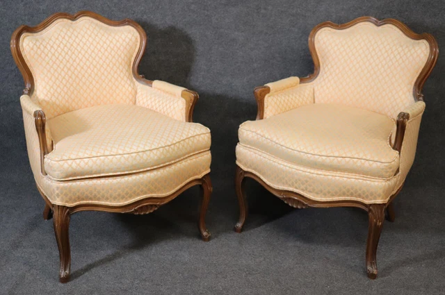 Pair of French Louis XV Style Carved Walnut Bergère Club Chairs, circa 1950