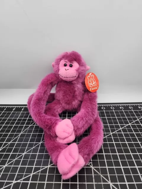 Fiesta plush Purple Monkey. Arms and legs have H&L on paws to hang. EUC W/tag