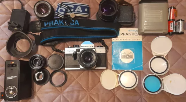 PRAKTICA Super TL 1000, mit verschiedenen Original-Objektiven u. v. Zubehör!