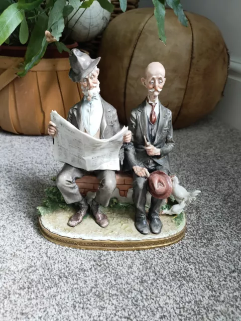 Capodimonte Giuseppe Cappe Men Sitting on Wall SUNDAY NEWS Figure rare