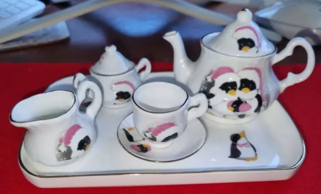 Bone China miniature tea set featuring Christmas penguins