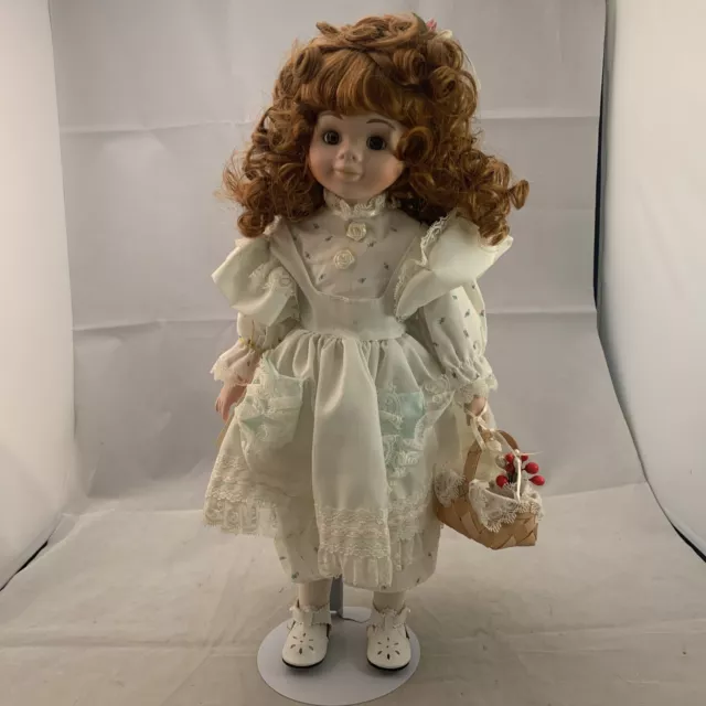 Design Debut Doll: 16-in Porcelain Doll w/ hang tag, basket and box very nice