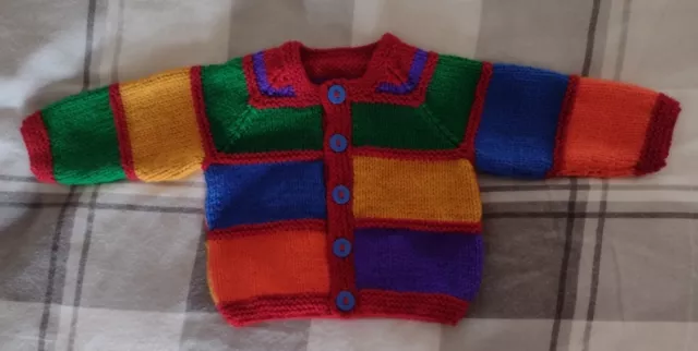 Hand knitted round neck baby Cardigan, approx 0-3 mths size, in bright colours