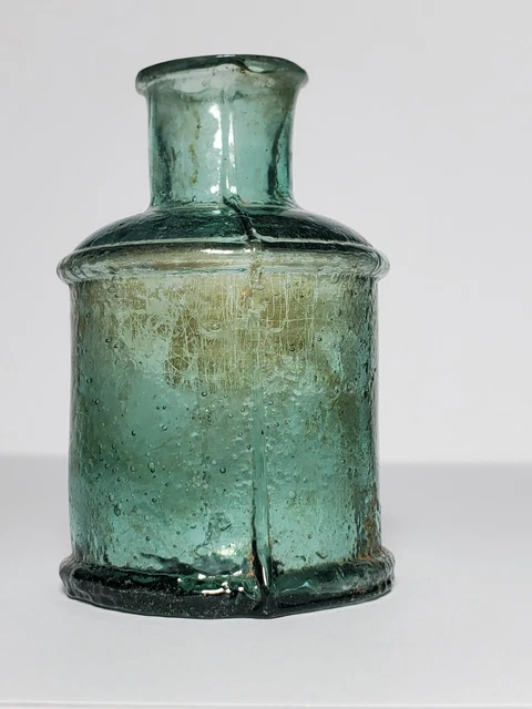 Antique glass inkwell.