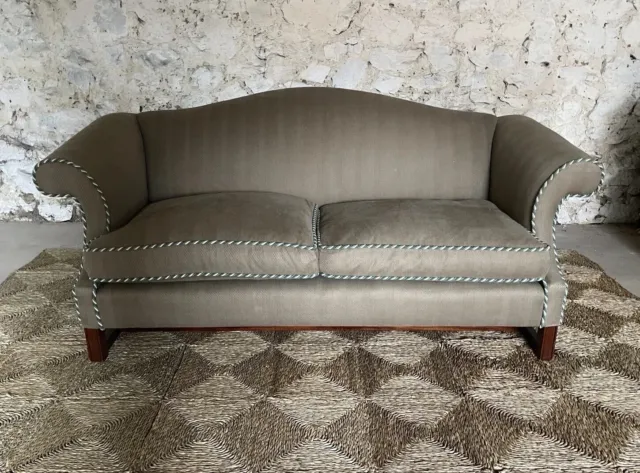 antique two seater sofa, upholstered by Sinclair Melson.  London W10.