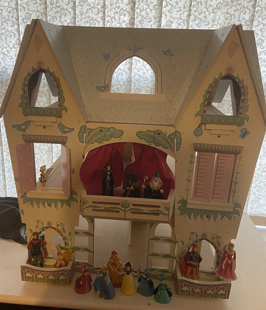 JOHN LEWIS WOODEN Dolls house/castle with lots off Disney figurines £50